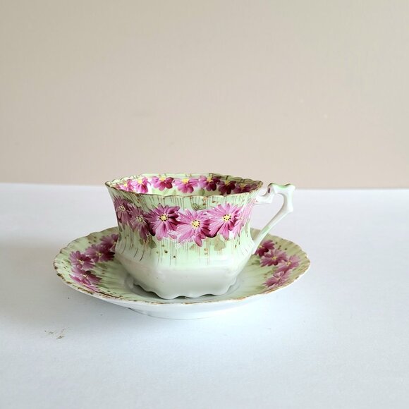 Antique porcelain tea cup with saucer with pink floral design and gold trim. - Picture 2 of 13